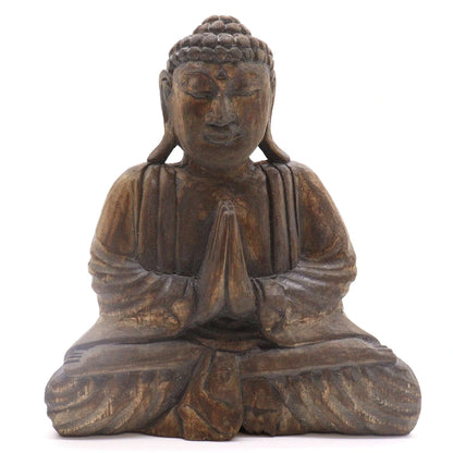 Statue de Bouddha en bois d'albasia gris, mains jointes, vue de face sur fond blanc
