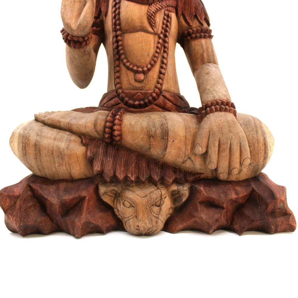 Statue de Shiva en bois de Suar, jambes croisées et tête de tigre sculptée sur le socle
