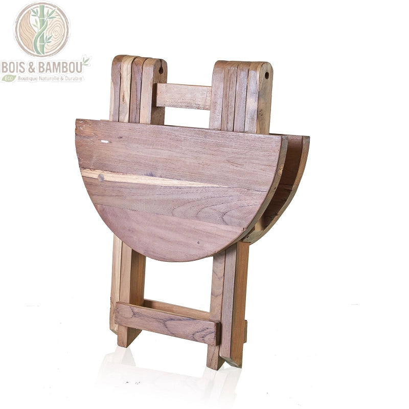 Table basse ronde pliante en teck recyclé en position repliée