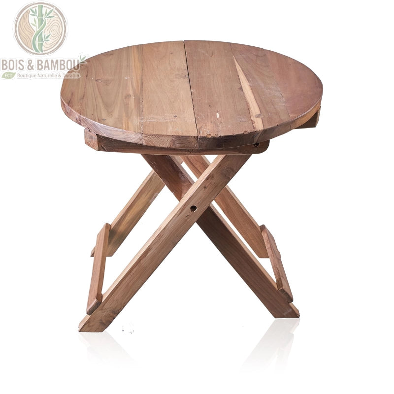 Table basse ronde pliante en teck recyclé dépliée vue de trois quarts